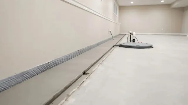 Finished basement floor with an interior drainage channel