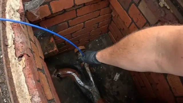 Sewer line cleaning access point opened for service